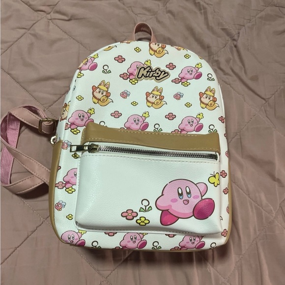 full kirby mini-backpack Bioworld Nintendo 3-D Travel Backpack 16" Sublimated Print Bag this set lets you celebrate Kirbys personality in a practical Kirby Pillow Star Charm Mini